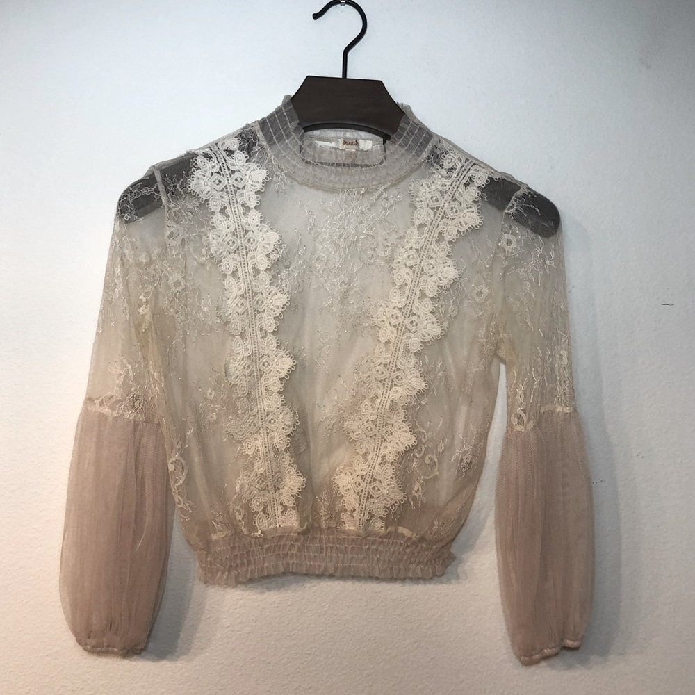 Beautiful laced  blouse.